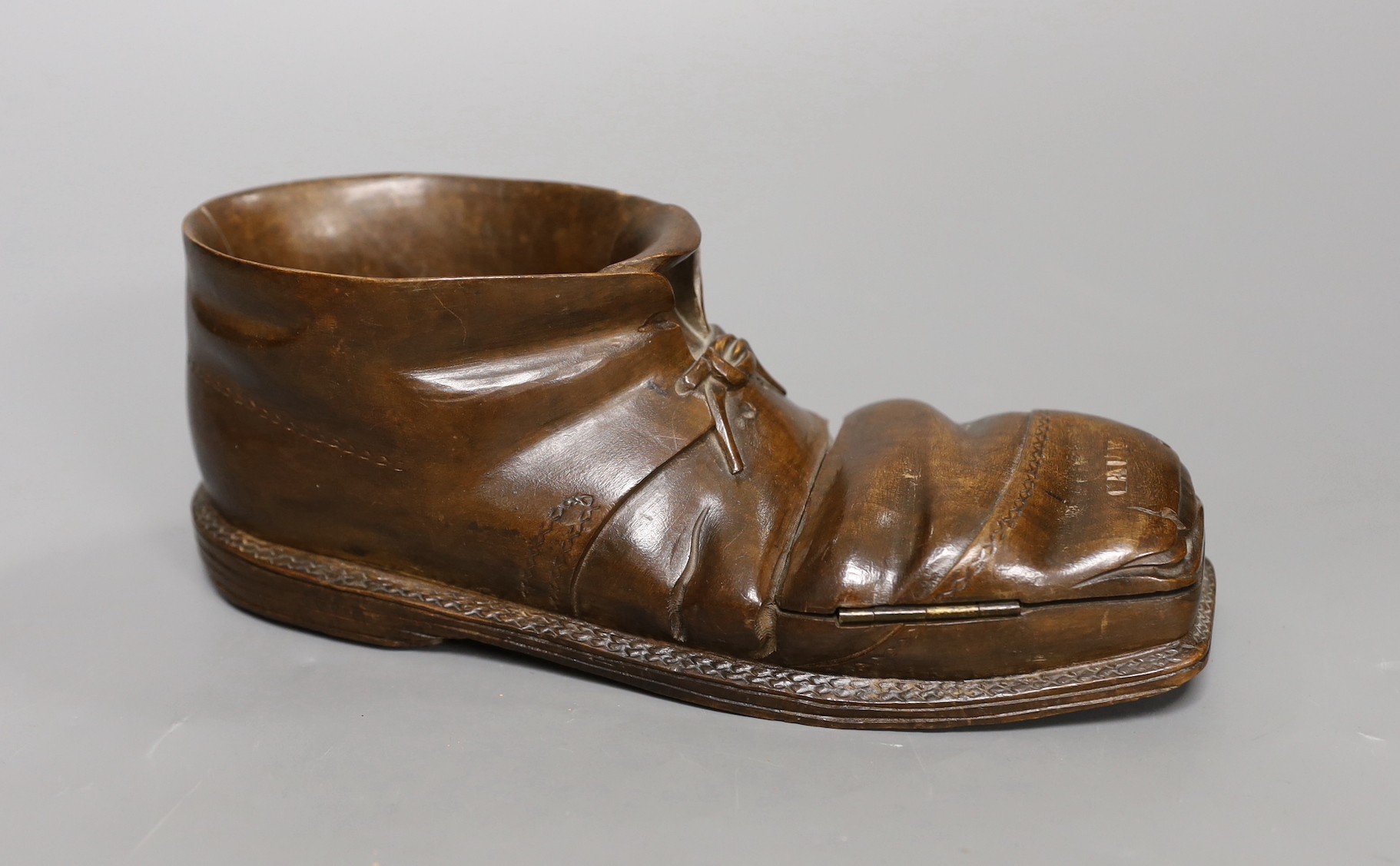 An early 20th century Swiss Caux treen 'boot' vesta case, 22cm long